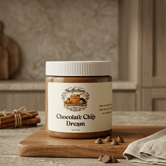 Chocolate Chip Dream nut butter jar styled on kitchen counter with cozy background.